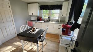 Køkken eller tekøkken på The Cottage