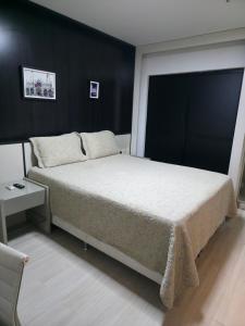 Postel nebo postele na pokoji v ubytování Flat Executive Arrey Hotel + 12 fotografií