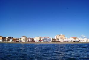 a view of a city from the water at Hotel Doña Luisa in San Luis de Sabinillas