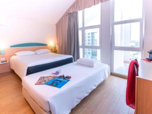 Postel nebo postele na pokoji v ubytování Hotel Ibis Firenze Nord Aeroporto