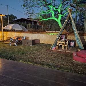 Herní místnost nebo prostor pro děti v ubytování Rancho Cipó Rosa