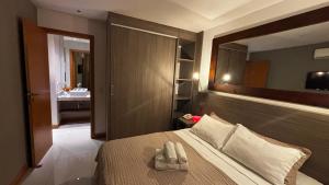 En eller flere senge i et værelse på FLAT Moderno próximo ao Riocentro - Rock in Rio - Projac - Farmasi Arena - Parque Olímpico