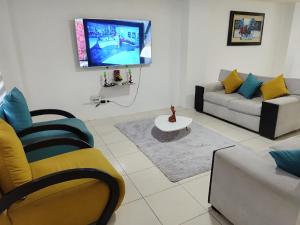 Μια τηλεόραση ή/και κέντρο ψυχαγωγίας στο Linda casa en la Playa