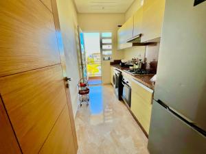 Dapur atau dapur kecil di Superbe appartement à Sidi Rahal