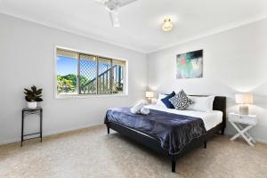 Ένα ή περισσότερα κρεβάτια σε δωμάτιο στο Coastal Bliss - 6 Beds Holiday House