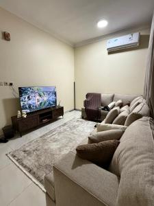 TV a/nebo společenská místnost v ubytování ستاي كوزي Stay Cozy