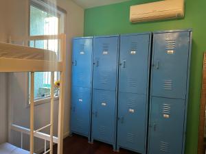 Μία ή περισσότερες κουκέτες σε δωμάτιο στο Hostel Casa 8