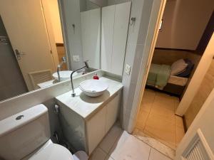 a bathroom with a sink and a toilet and a mirror at Hostel Casa 8 in Rio de Janeiro +113 photos