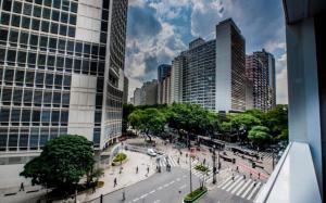 a view of a city street with tall buildings at Luxo e Comodidade Sentin Sao Luiz in Sao Paulo +16 photos