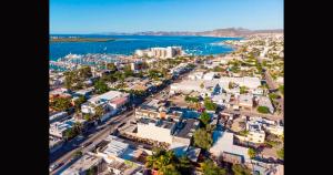 an aerial view of a city and the ocean at Santa Cruz Suites #1 in La Paz