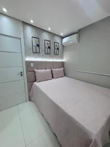 Katil atau katil-katil dalam bilik di Apartamento COP 30 , próximo ao evento