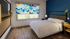 Postel nebo postele na pokoji v ubytování Tru By Hilton Palmerola Airport Comayagua