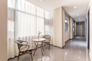 Χώρος καθιστικού στο Guangzhou Oulan Hotel