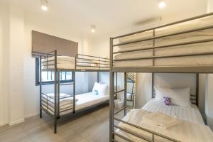 a room with two bunk beds and a bed at Sleep With Sheep - 3 Bedroom Pool Villa in Chiang Mai +20 photos