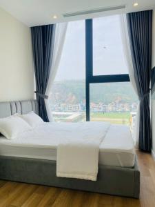 Katil atau katil-katil dalam bilik di Hạ Long ICON40 NGHỈ DƯỠNG
