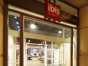 a building with a sign on the front of a store at ibis Reading Centre in Reading