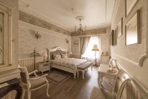 Postel nebo postele na pokoji v ubytování Gabi B&B