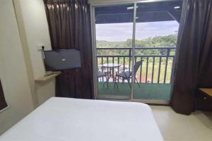 Μια τηλεόραση ή/και κέντρο ψυχαγωγίας στο Larut Hillview Kabin