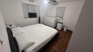 Ένα ή περισσότερα κρεβάτια σε δωμάτιο στο Vermont Ski and Stay
