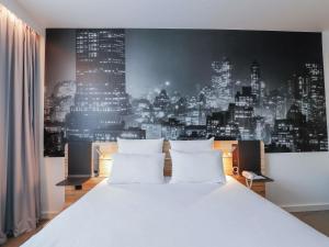 Postel nebo postele na pokoji v ubytování Novotel Luxembourg Centre + 135 fotografií