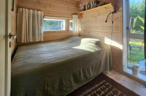 Ένα ή περισσότερα κρεβάτια σε δωμάτιο στο Family Cabin With Views Over Hadeland