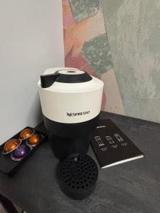a coffee maker sitting on top of a table at Belgrade Nest in Belgrade