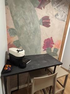 a table with a sewing machine on top of it at Belgrade Nest in Belgrade +7 photos