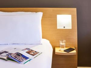 Postel nebo postele na pokoji v ubytování Novotel Bristol Centre + 102 fotografií