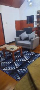 O zonă de relaxare la Cabin wetan kali dieng 04