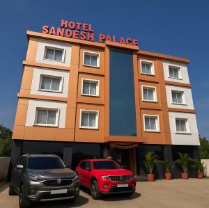 two cars parked in front of a hotel sandwich palace at Hotel Sandesh Palace Lonavala in Lonavala