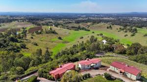 an aerial view of a house on a hill at Bimbadeen Estate Villa 2 in Mount View