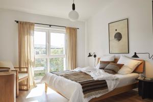 Postel nebo postele na pokoji v ubytování MATT - Apartments ' Penthouse mit Dachterrasse