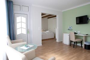 TV o dispositivi per l'intrattenimento presso Frühstückshotel Seemannsbraut Amrum-adults only ab 18 Jahre-keine Haustiere-