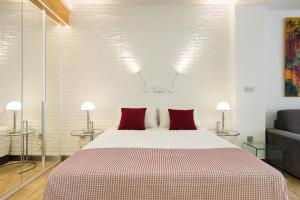Posteľ alebo postele v izbe v ubytovaní Suites Garden Loft Kandinsky