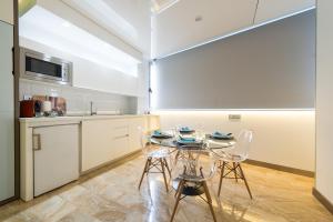 Kuchyňa alebo kuchynka v ubytovaní Suites Garden Loft Kandinsky