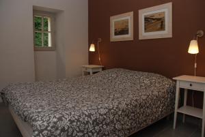 Lavau Vacances Gites tesisinde bir odada yatak veya yataklar