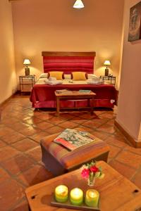 Un pat sau paturi într-o cameră la Hotel El Reposo Del Diablo
