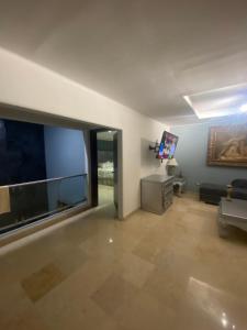 TV a/nebo společenská místnost v ubytování Casa azul particular
