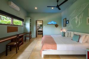 Ένα ή περισσότερα κρεβάτια σε δωμάτιο στο Awimbawei House