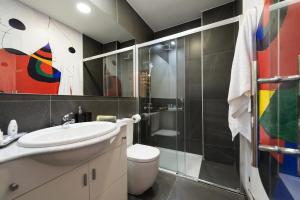 Ein Badezimmer in der Unterkunft Suites Garden Loft Miro