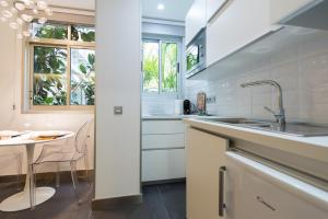 Küche/Küchenzeile in der Unterkunft Suites Garden Loft Miro