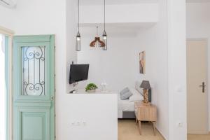 Μια τηλεόραση ή/και κέντρο ψυχαγωγίας στο Chora Sea View Residence