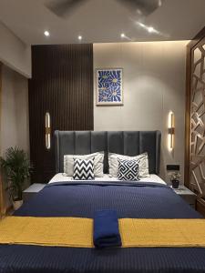 Ένα ή περισσότερα κρεβάτια σε δωμάτιο στο Mon Homes