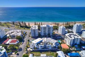 an aerial view of a city and the ocean at Mooloolaba Magic at Beachclub Mooloolaba in Mooloolaba