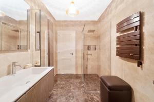 a bathroom with a sink and a shower at Villa Valentina in Tremezzo +68 photos