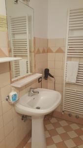 a bathroom with a white sink and a mirror at Agriturismo Ae Noseare in Torri di Quartesolo +43 photos