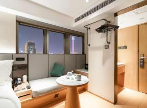 Ruang duduk di JI Hotel Guangzhou Zhujiang New Town