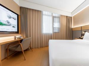 Μια τηλεόραση ή/και κέντρο ψυχαγωγίας στο JI Hotel Shanghai Wuning Road Subway Station (formerly Changshou Road Yaxin Plaza Branch)