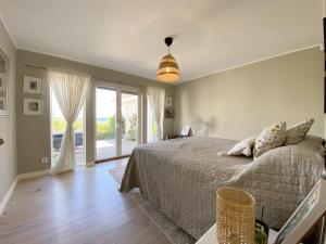 Postel nebo postele na pokoji v ubytování Holiday home in scenic Kattvik, Bastad