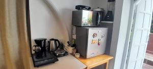 Una cocina o cocineta en apartamento 3 habitaciones totalmente equipado